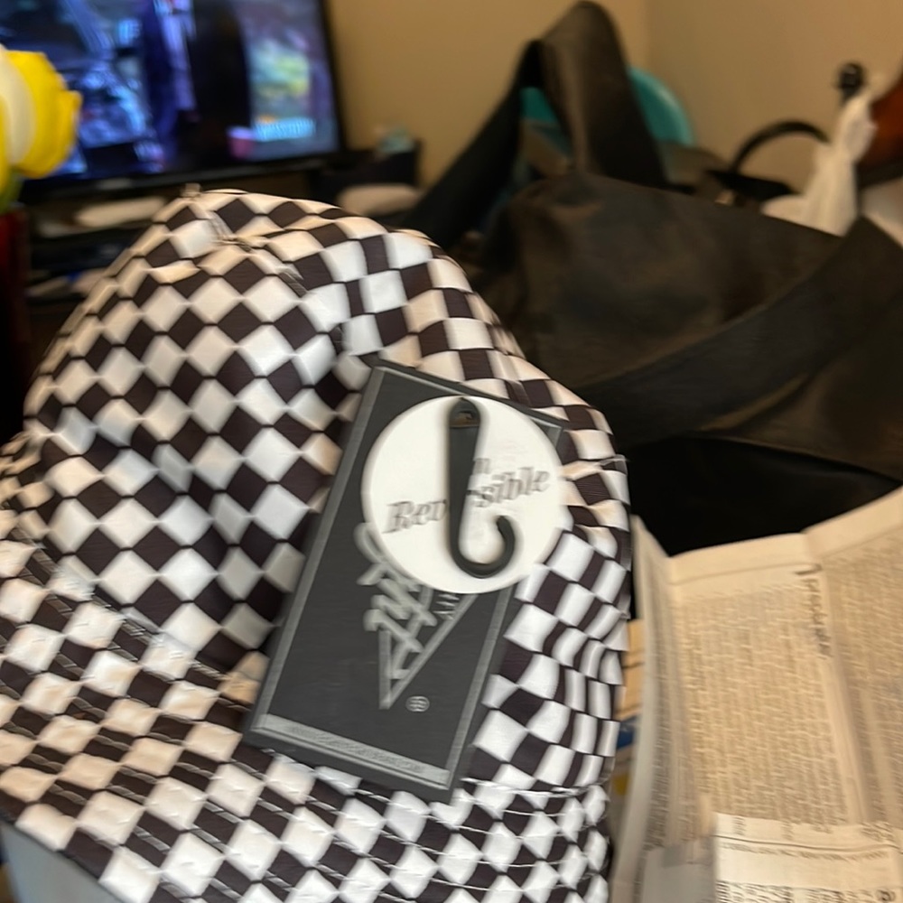 One size fit all reversible black and white but other side black